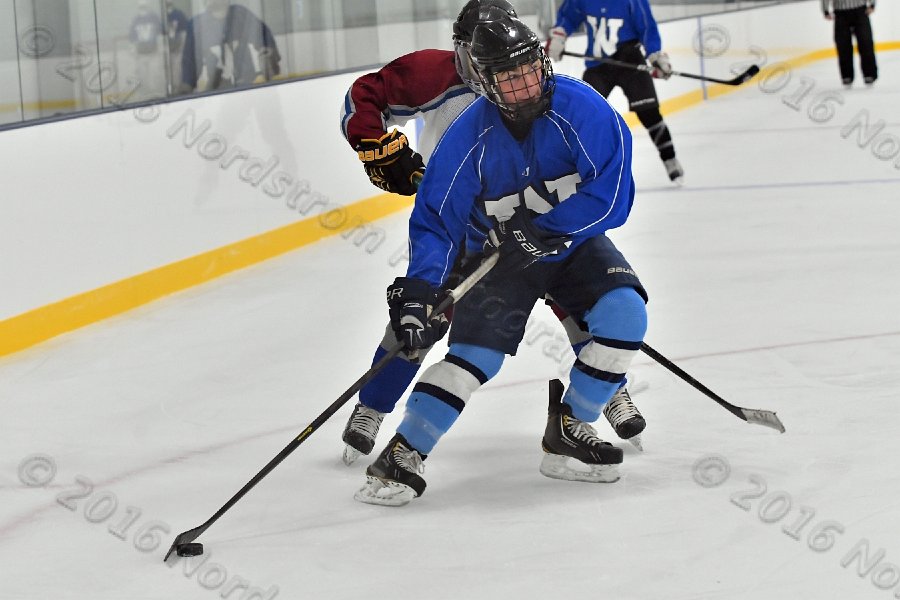 Wheaton College Men\'s Ice Hockey vs Middlesex Community College. - Photo By: KEITH NORDSTROM